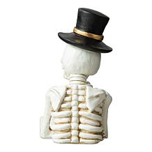 Glitzhome 10.25in. H Halloween Lighted Resin Skull Book Table Decor