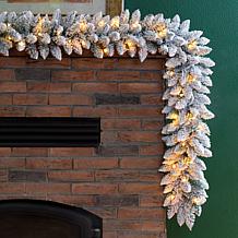 Glitzhome 9' Snow Flocked Christmas Garland with Warm White LED Lights