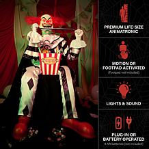 Haunted Hill Farm 4.1-Ft. Sitting Scareclown with Saw & Candy Anima...