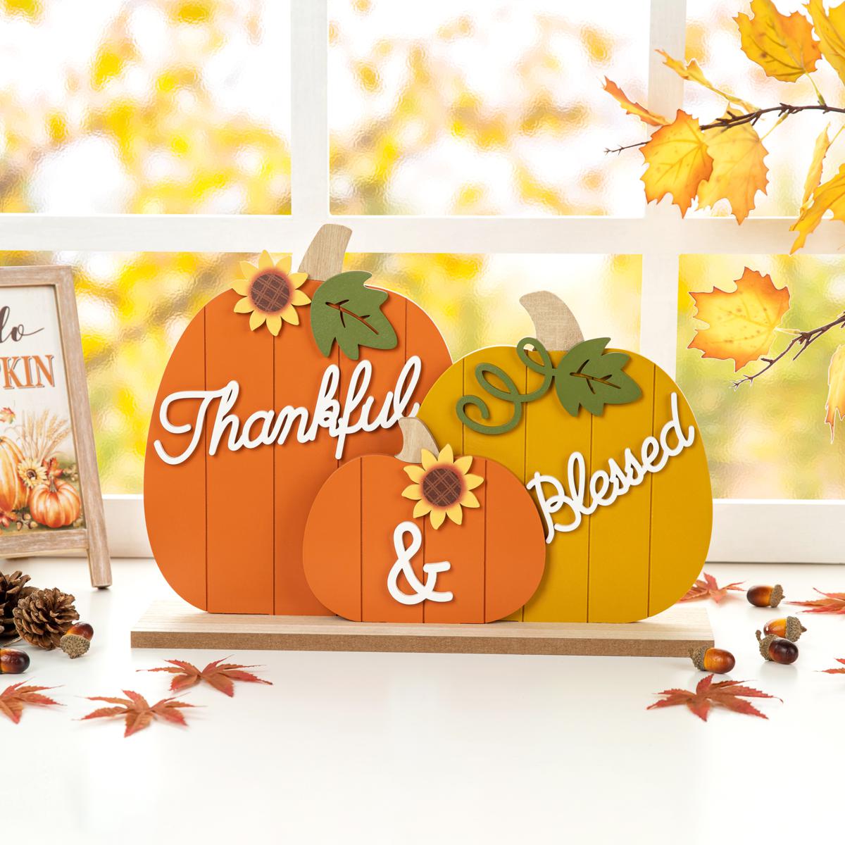 https://i04.hsncdn.com/is/image/HomeShoppingNetwork/rocs1200/glitzhome-16in-l-thanksgiving-wooden-pumpkins-table-dec-d-20230914075924117~22072611w_alt1.jpg