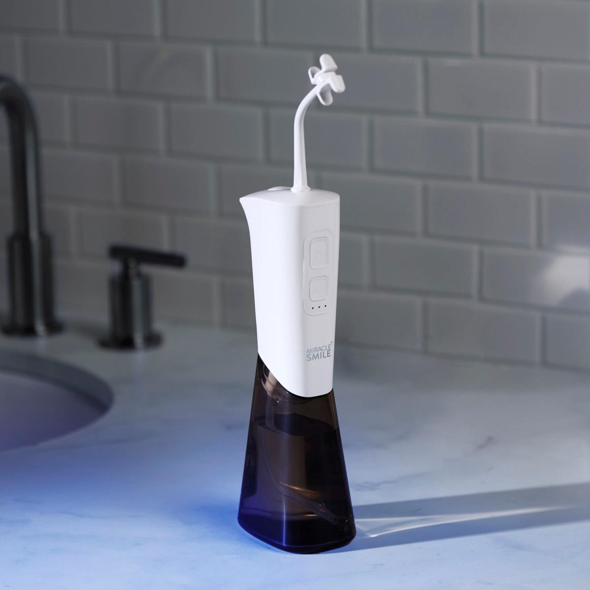 Miracle Smile Deluxe Pro Water Flosser with 10 Flossing Heads | HSN